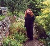 Jane standing in some greenery at Hucklow