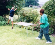 William and Doris playing imaginary ping pong